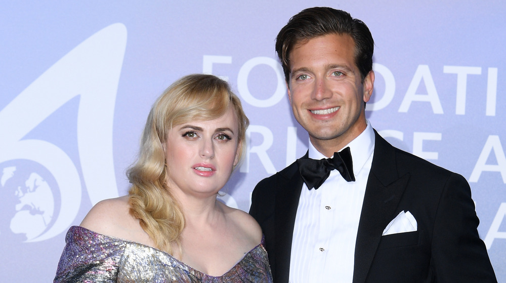 Rebel Wilson poses with Jacob Busch