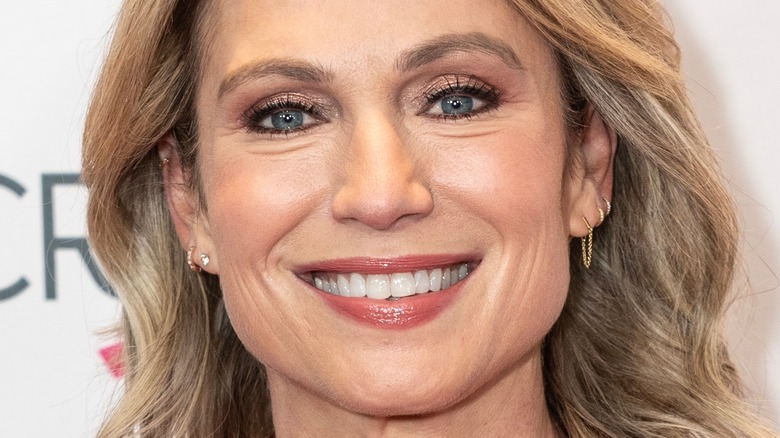 Amy Robach smiles on a red carpet