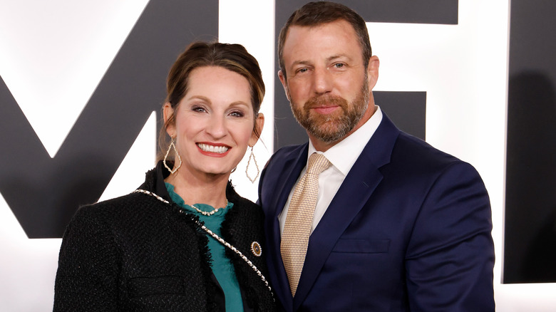 Christie and Markwayne Mullin pose together at the premiere for 'Melania.'
