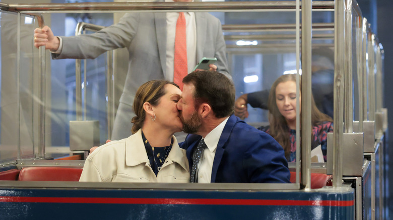 Christie and Markwayne Mullin kiss on the Senate Subway.