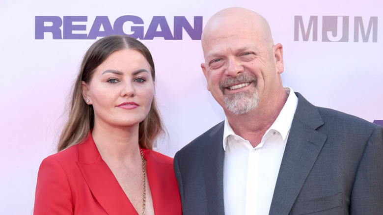 Angie Polushkin posing with a smiling Rick Harrison