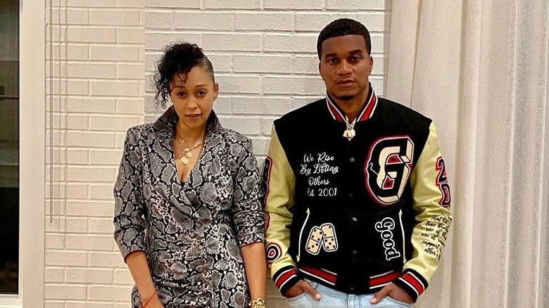 Tia Mowry and Cory Hardrict posing