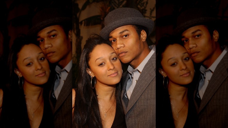 Tia Mowry and Cory Hardrict hug