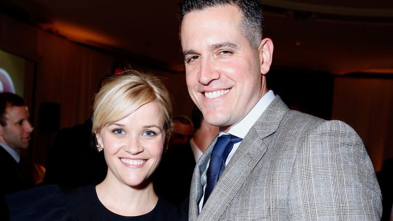 Reese Witherspoon and Jim Toth smiling 