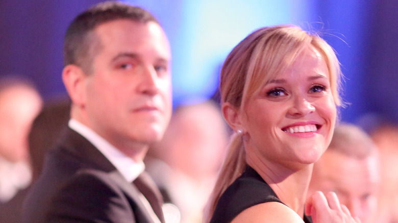 Reese Witherspoon and Jim Toth posing 