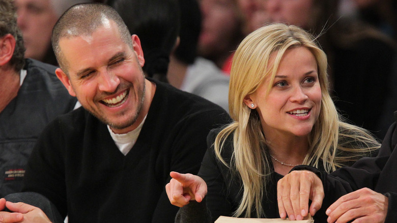 Reese Witherspoon and Jim Toth laughing 