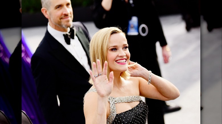 Reese Witherspoon and Jim Toth smiling 