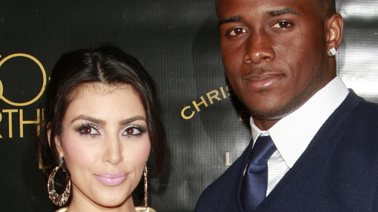 Kim Kardashian and Reggie Bush on the red carpet
