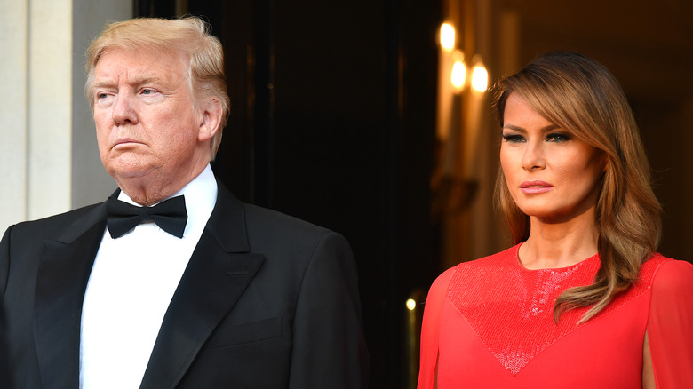 Donald and Melania Trump staring