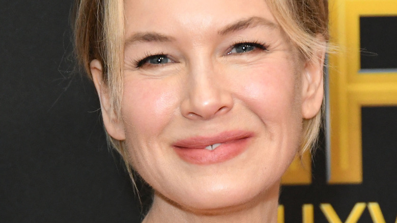 Renee Zellweger smiles on red carpet