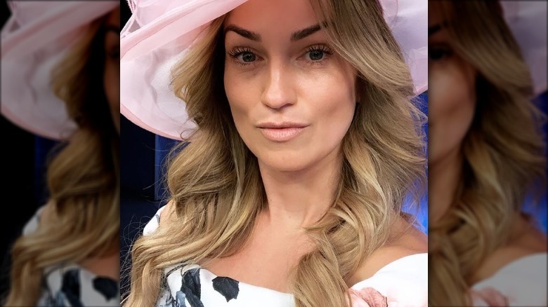Kelly Stewart in a big pink hat