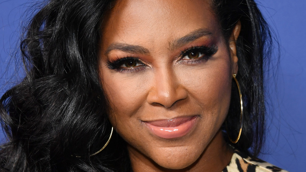 Kenya Moore looks at the camera