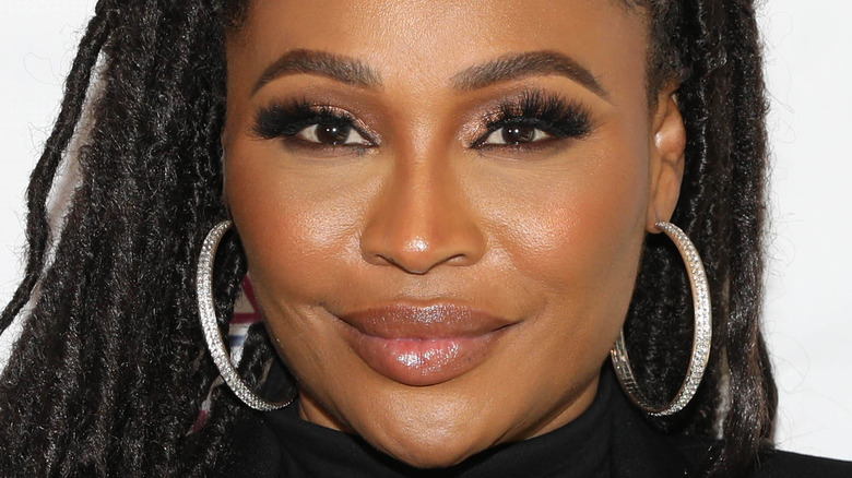 Cynthia Bailey with diamond hoop earrings