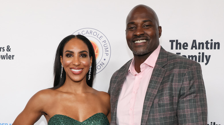 Annemarie and Marcellus Wiley stand together at event