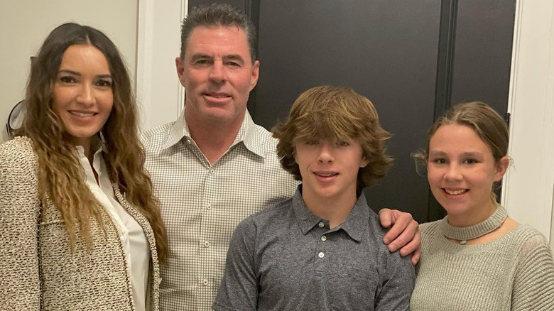 Jim Edmonds and Kortnie O'Connor posing with kids