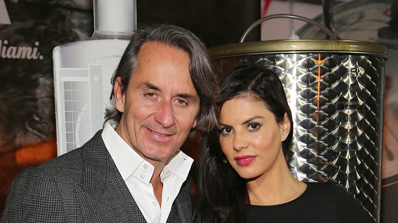 Frederic Marq and Adriana de Moura stand side by side