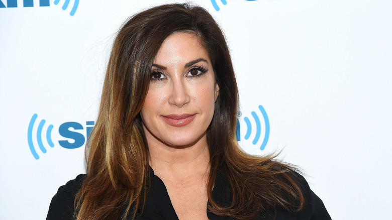 Jacqueline Laurita, smirking