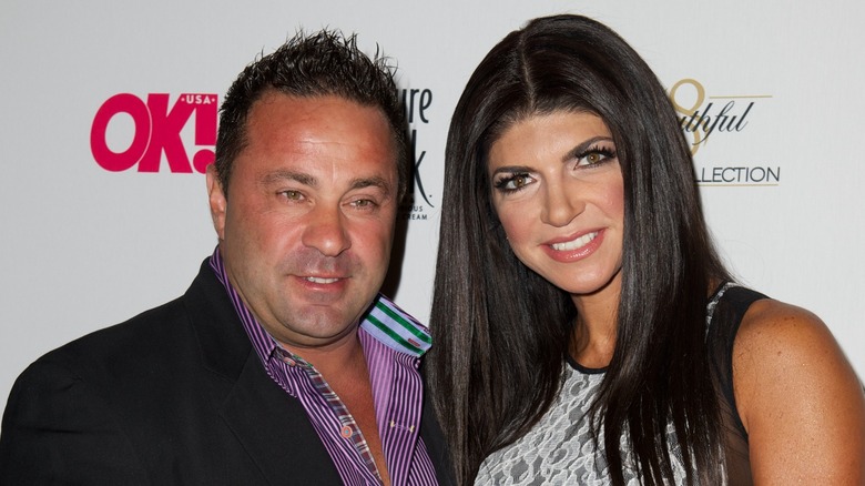 Joe Giudice posing with Teresa Giudice