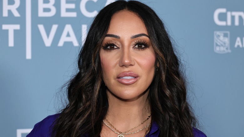Melissa Gorga poses at an event.