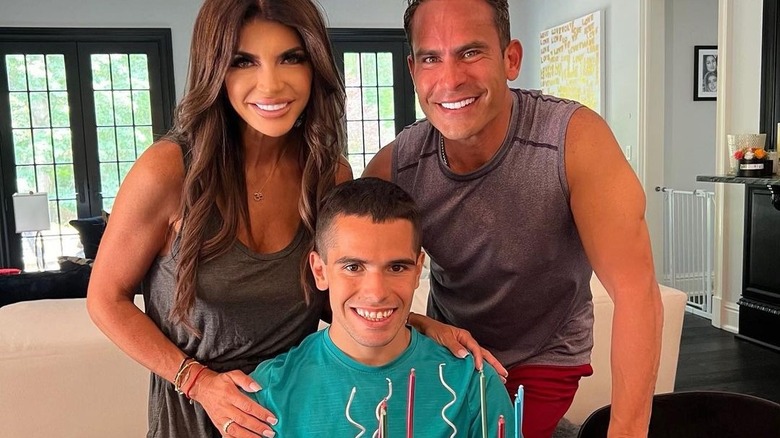 Teresa Giudice and Louie Ruelas posing with Nicholas Ruelas