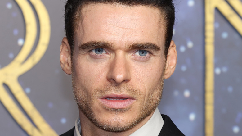 Richard Madden posing