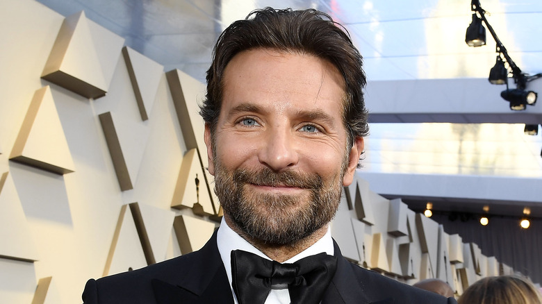Bradley Cooper smiling wearing tuxedo 