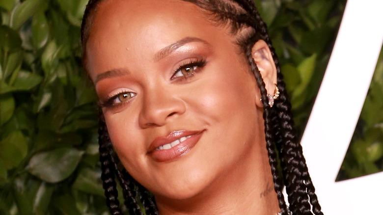Rihanna and A$AP Rocky smile