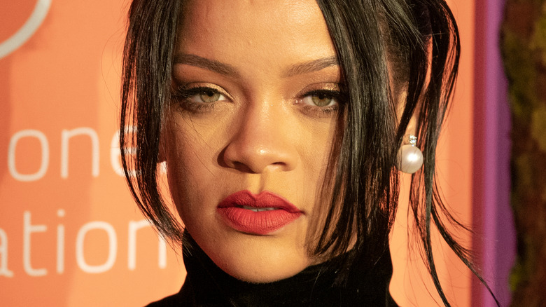 Rihanna smirking