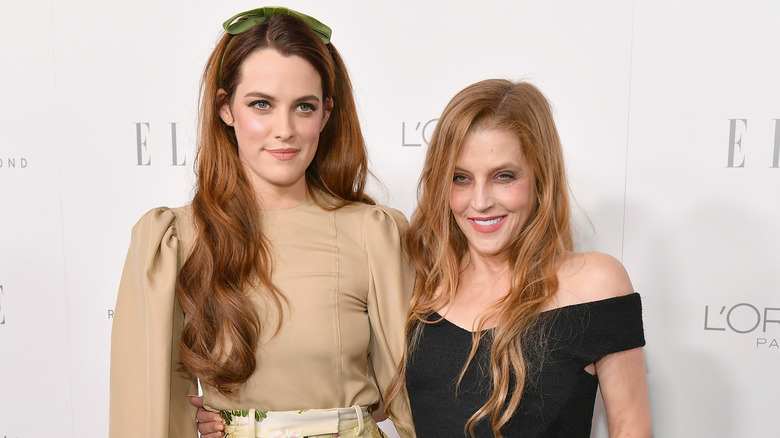 Riley Keough and Lisa Marie Presley posing