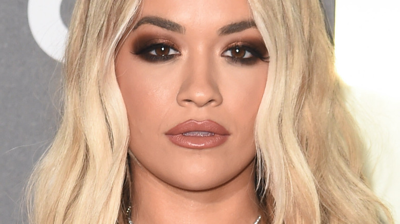 Rita Ora with platinum blonde hair