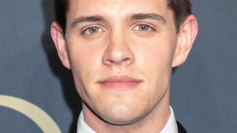 Casey Cott posing for cameras