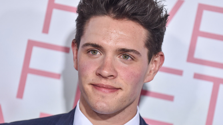 Casey Cott posing for cameras