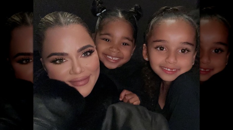 Khloe Kardashian, True Thompson, and Dream Kardashian at movie theater