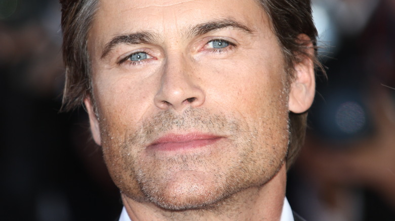 Rob Lowe with a serious expression