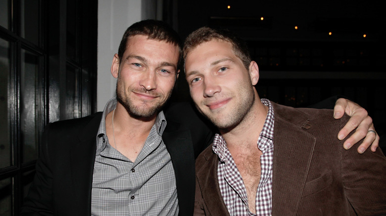 Actors Andy Whitfield and Jai Courtney attend Have a Heart for Haiti in 2010