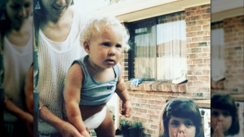 Jai Courtney as a toddler with his mother and sister