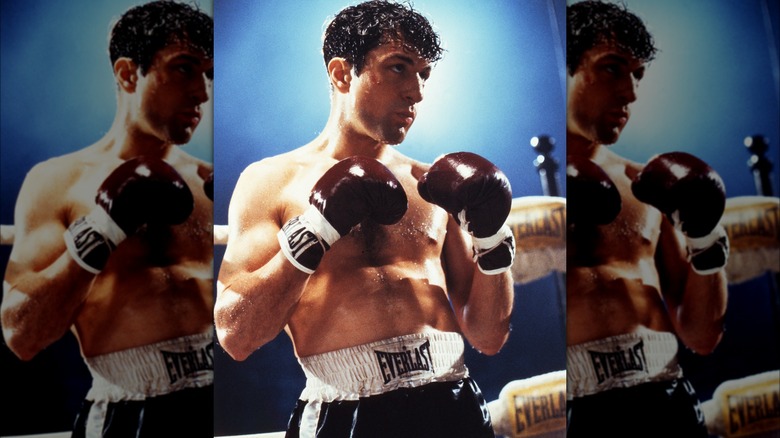 Robert De Niro wearing boxing gloves