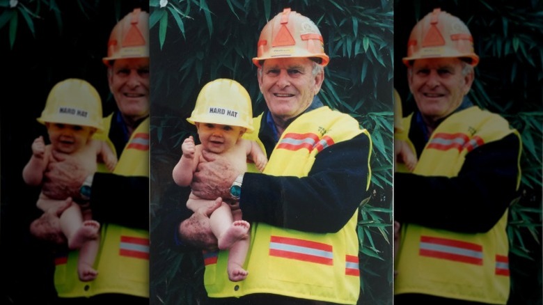 Clarence Raines holds baby Bindi Irwin