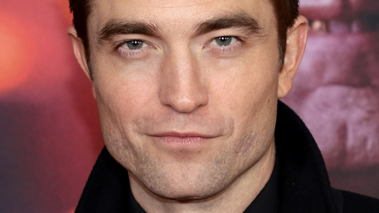 Robert Pattinson smirking
