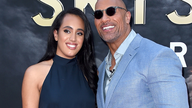 Simone and Dwayne Johnson posing
