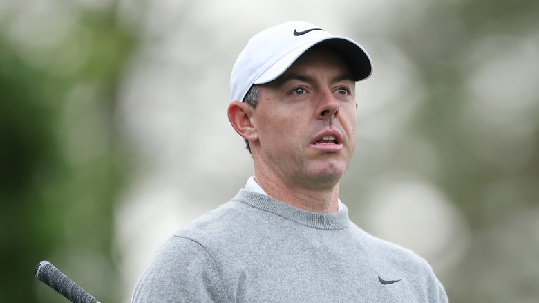 Rory McIlroy looking off to the side.