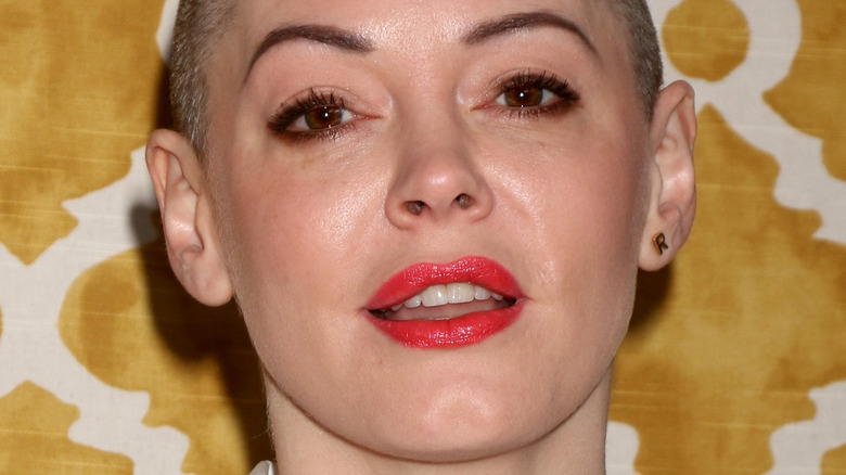 Rose McGowan with a neutral expression