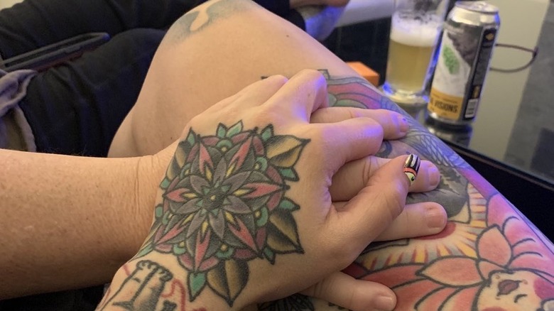 Rosie O'Donnell holds hands