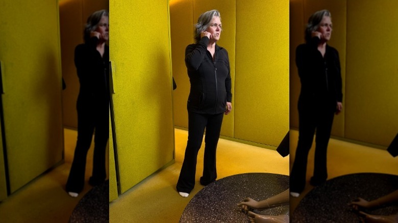 Rosie O'Donnell is captured standing in a dressing room