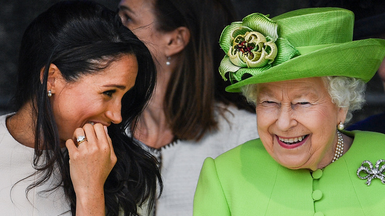 Meghan Markle and Queen Elizabeth II talking