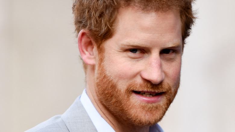 Prince Harry with a serious expression