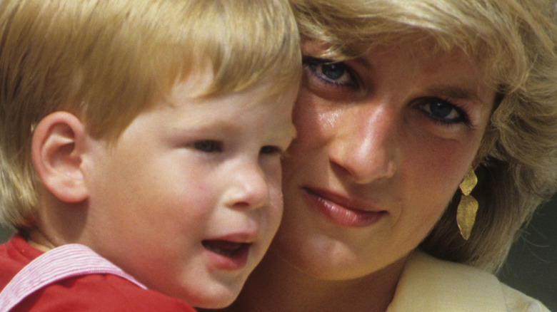 Prince Harry and Princess Diana smiling