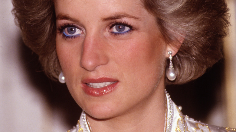 Princess Diana looking to the side at public event