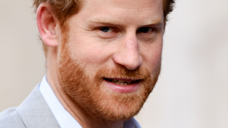 Prince Harry looking on