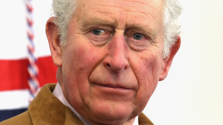 Prince Charles looking away